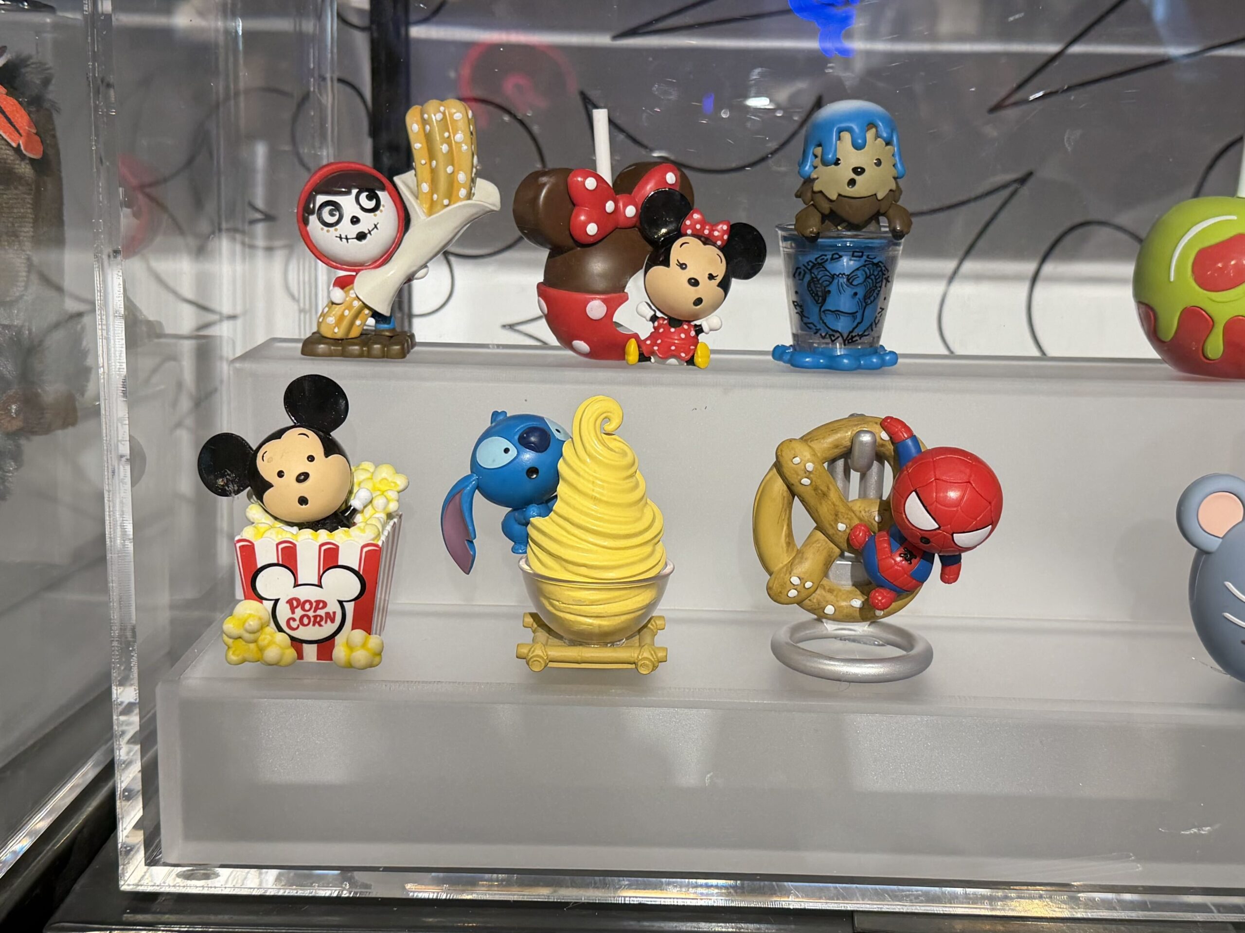Mickey and Friends, Toy Story, Alice in Wonderland, and More Characters Featured in New Mystery Packs at Disney Springs