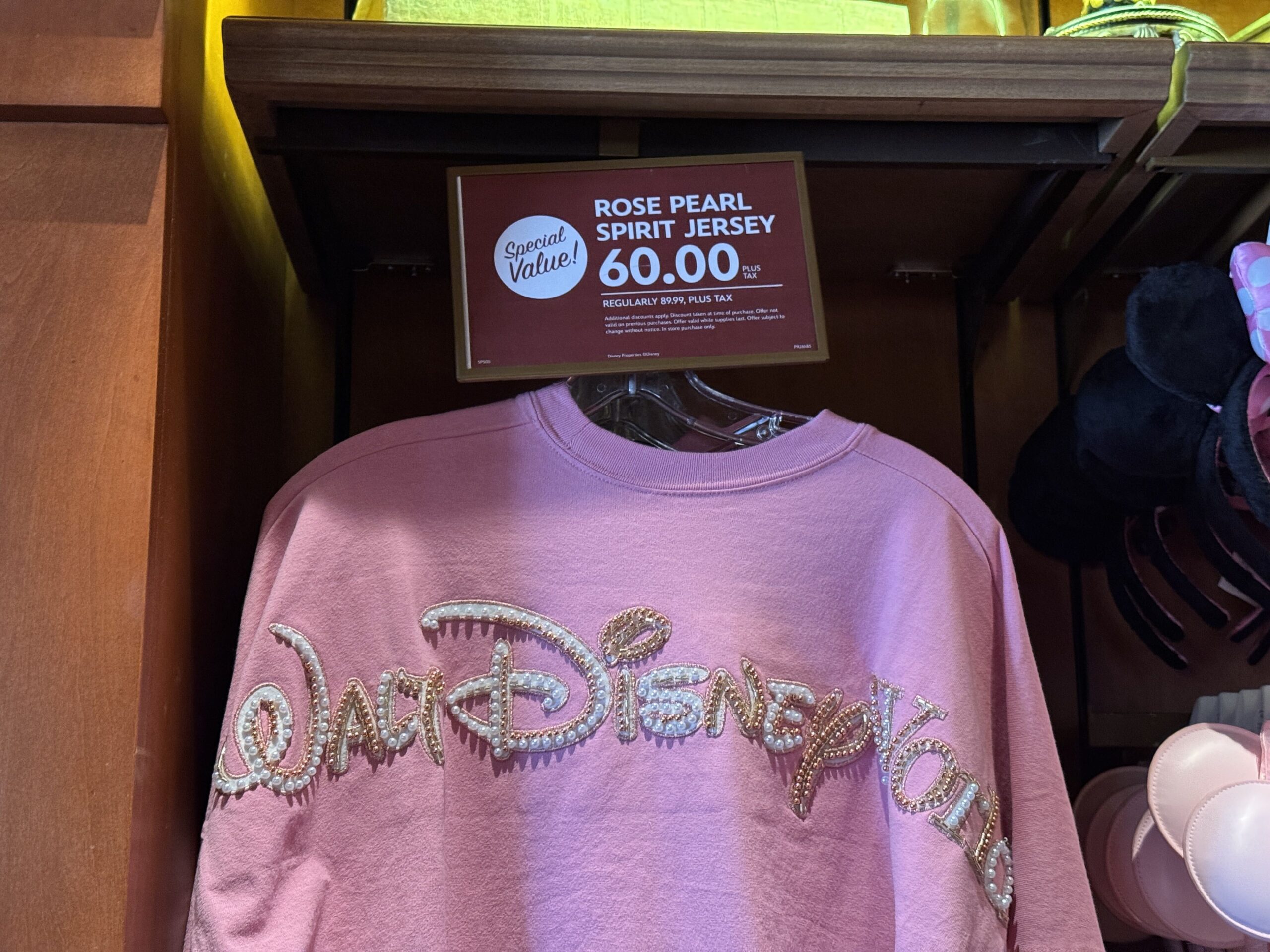Pearl- and Bead-Embellished Rose Gold Spirit Jersey Now Discounted at Walt Disney World - WDWNT