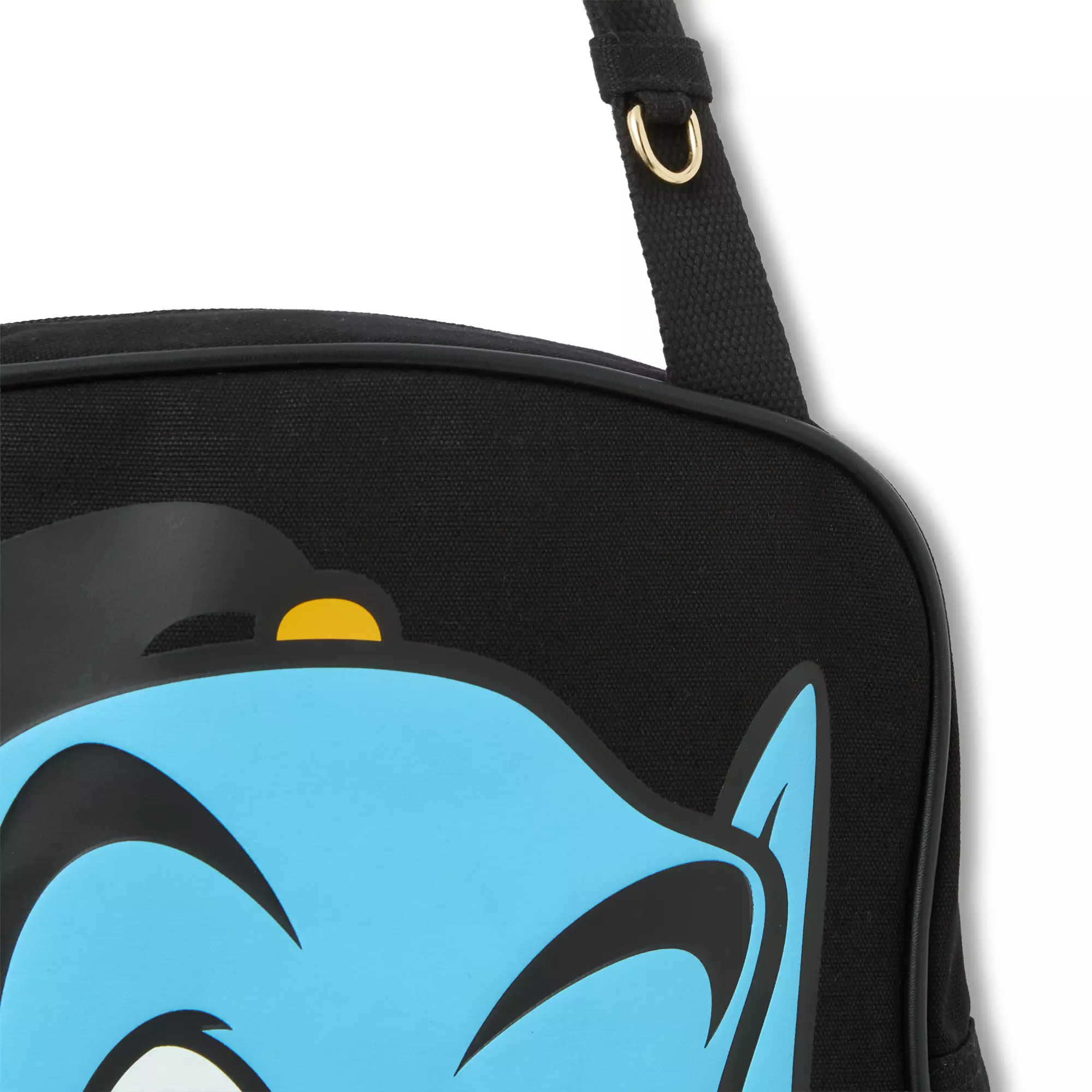 12-inch canvas straps for carrying feature a metal key ring to connect bag charms or other adornments.