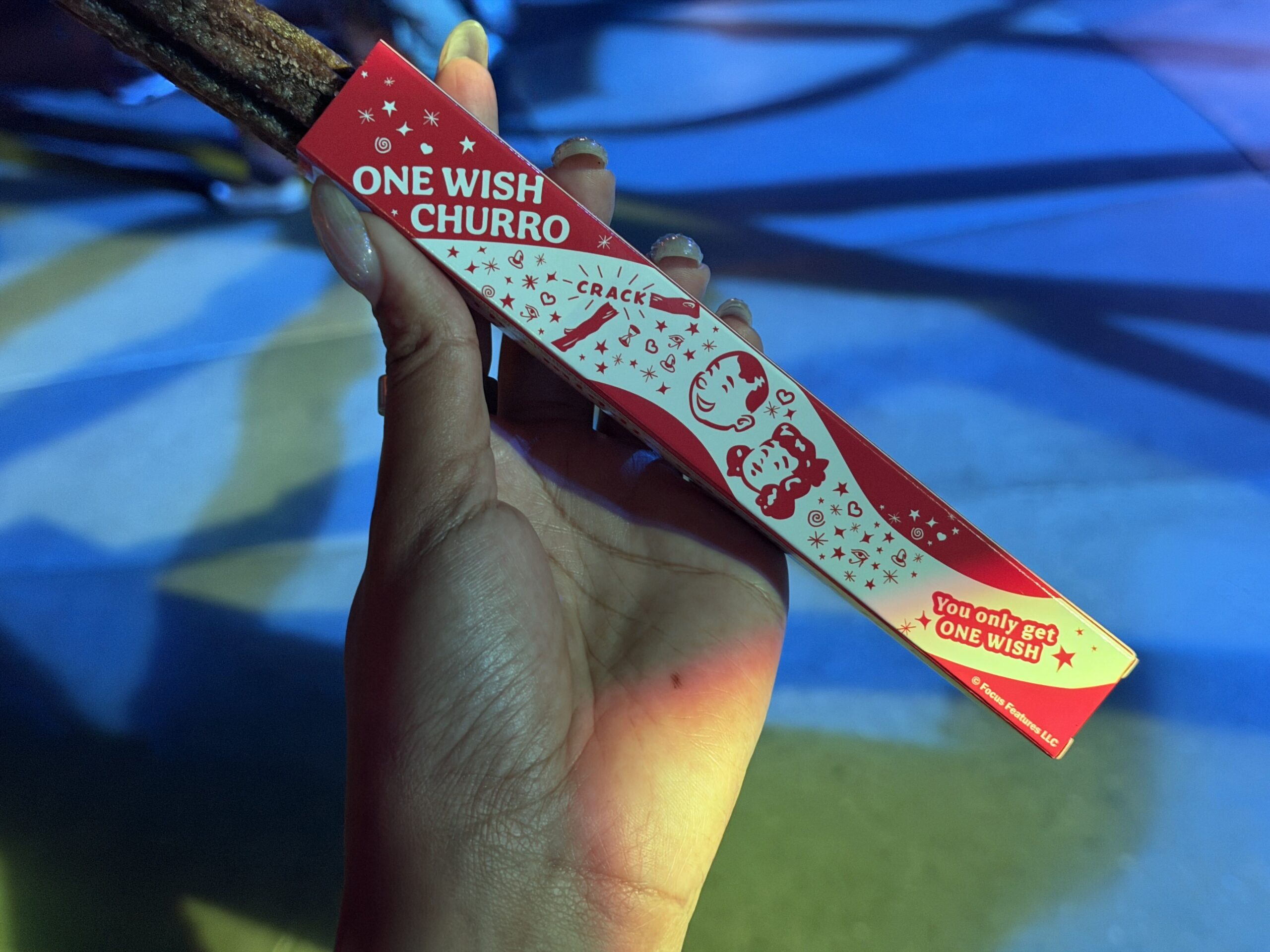 The One Wish churro, inspired by the film Obsession and a play on the One Wish Willow, is available exclusively at Universal Studios Hollywood for Halloween Horror Nights.