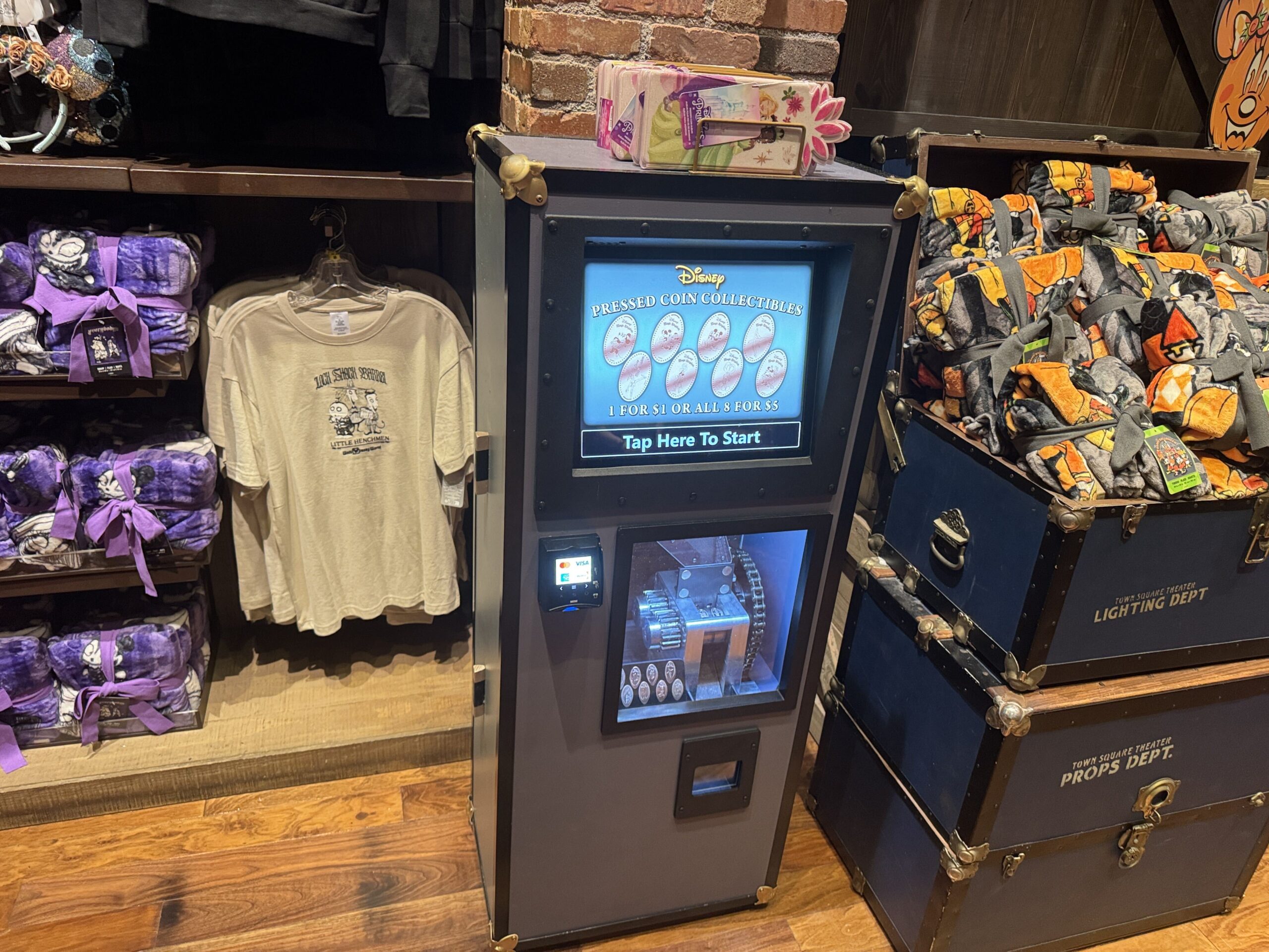 An upgraded pressed penny machine was spotted in Curtain Call Collectibles at Magic Kingdom