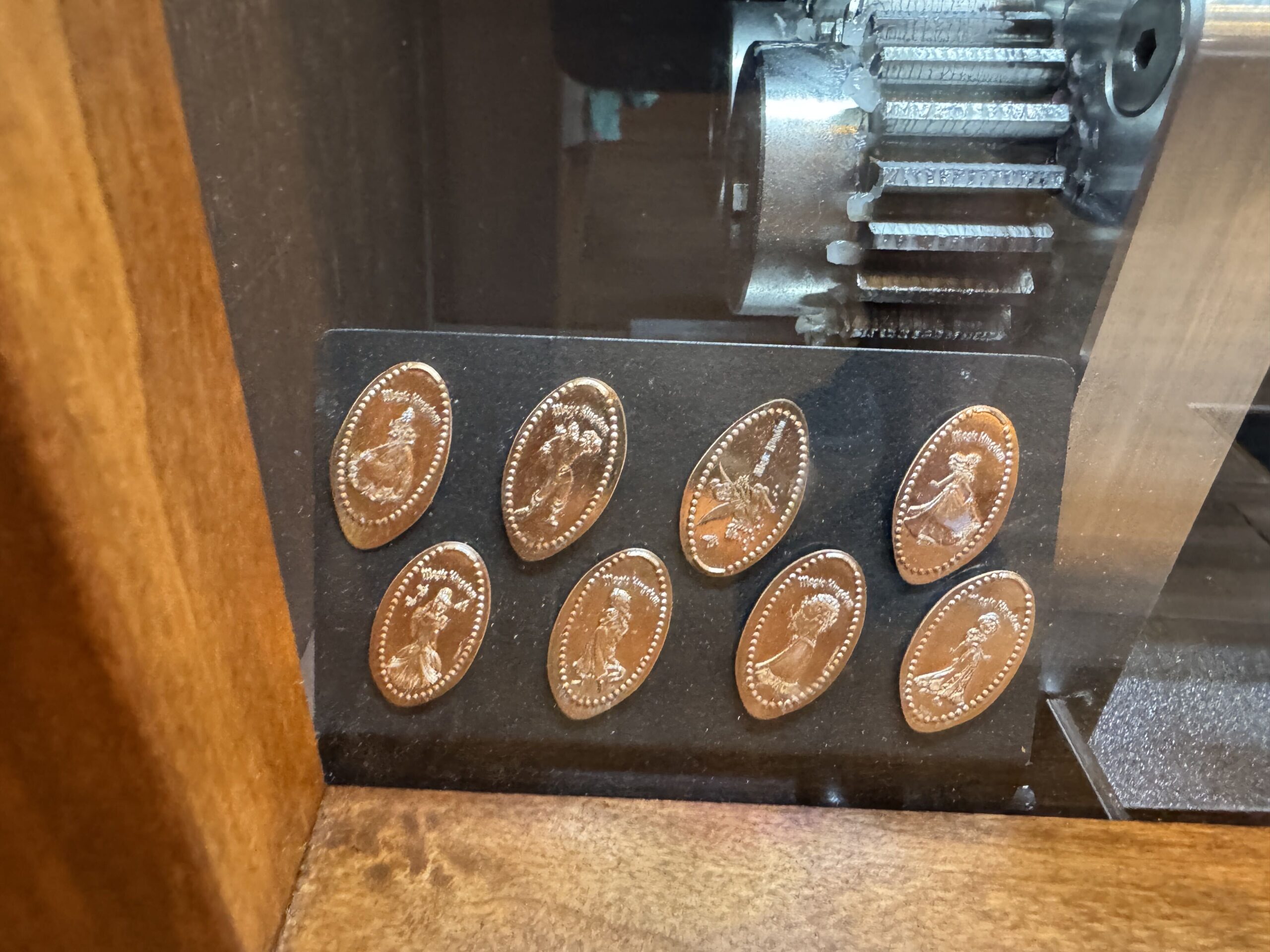An upgraded pressed penny machine was spotted in the Emporium at Magic Kingdom